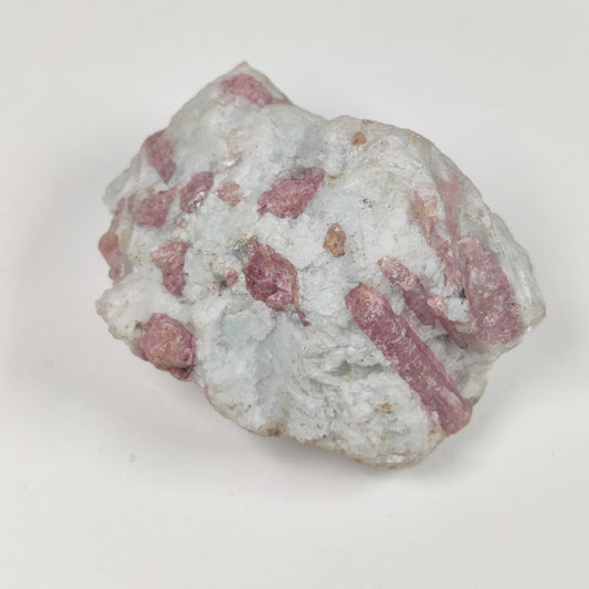 Pink Tourmaline ((Rossmanite) Meaning and Properties