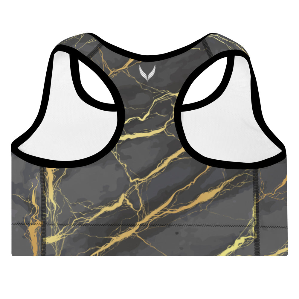 Voyager women's Gold Vein padded sports bra featuring a sleek black base with striking gold and gray vein patterns. Designed for high performance and style, this sports bra provides excellent support and comfort with padded cups and a racerback design. Perfect for workouts or everyday wear
